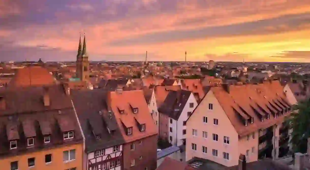 Settle into one of the many historic boutique hotels Nuremberg has to offer as the sun sets over the city