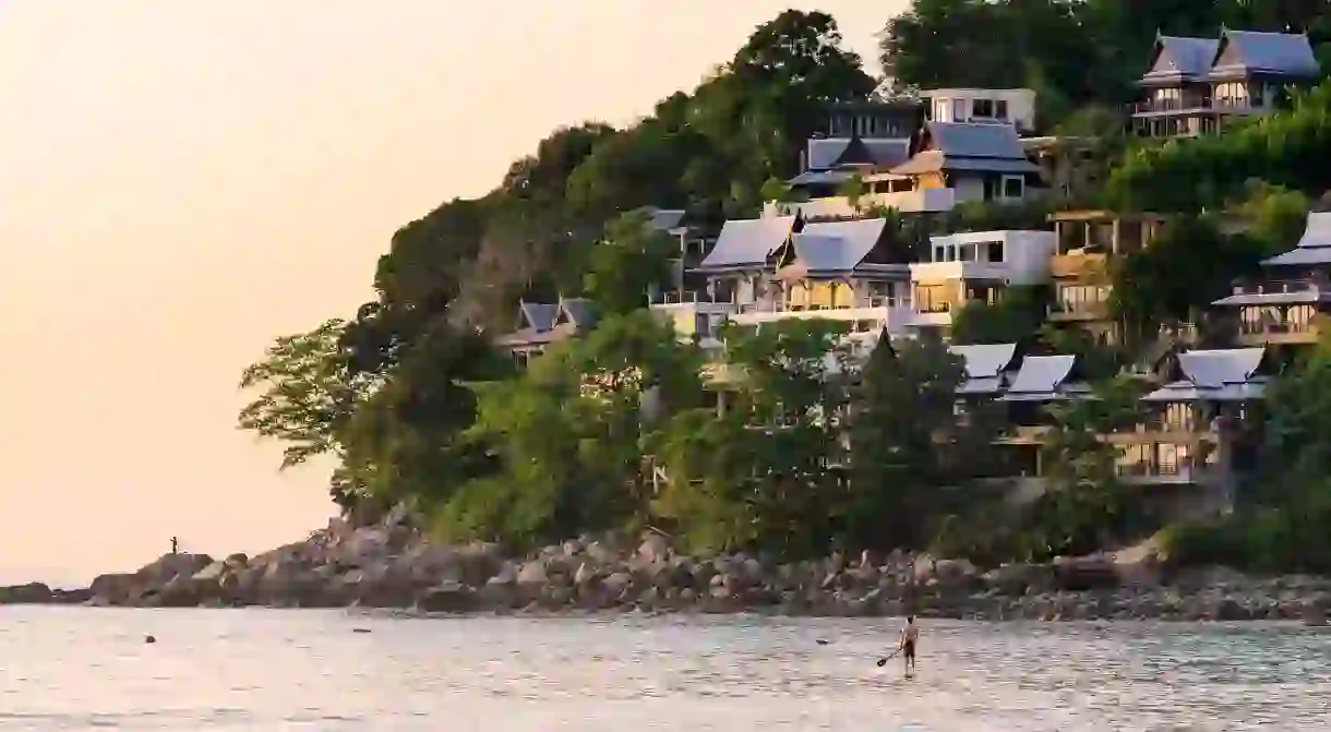 Go for a sunset swim by Kamala Beach in Phuket, Thailand