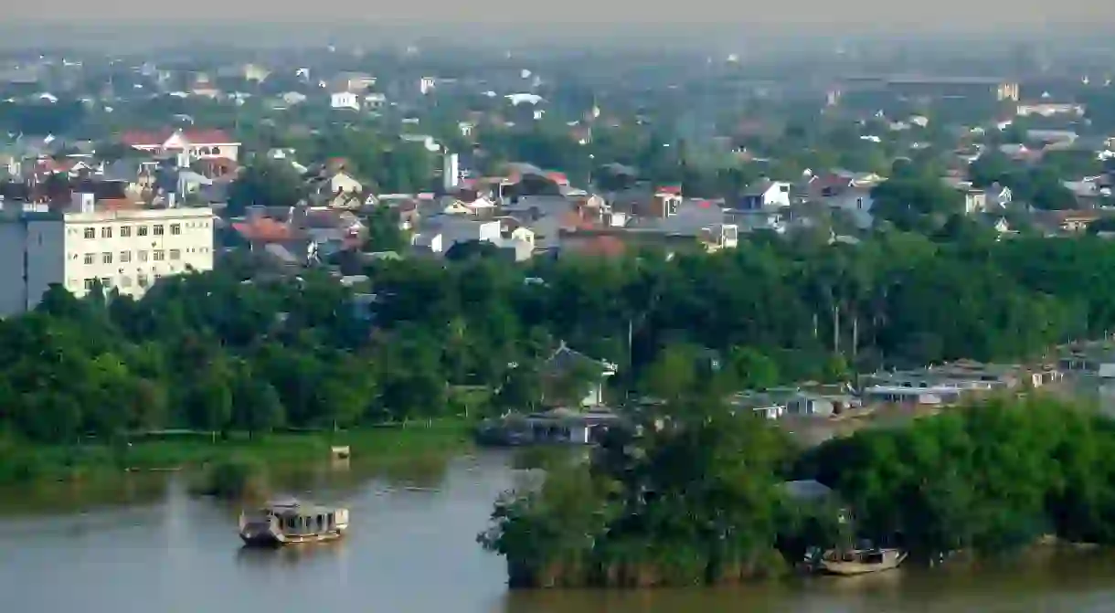 The Perfume River crosses the ancient Vietnamese city of Hue