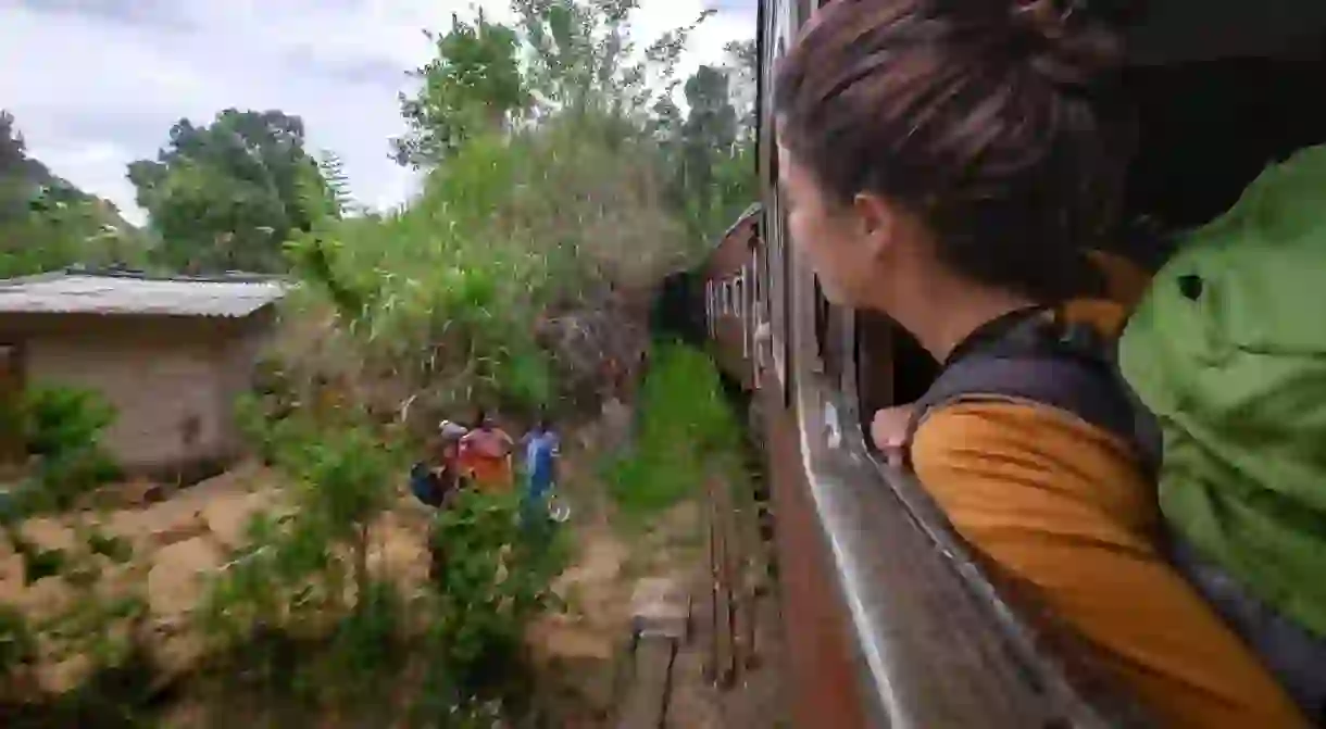 Join a local train crossing the Nine Arches Demodara Bridge to gain insight into the unique beauty of Sri Lanka