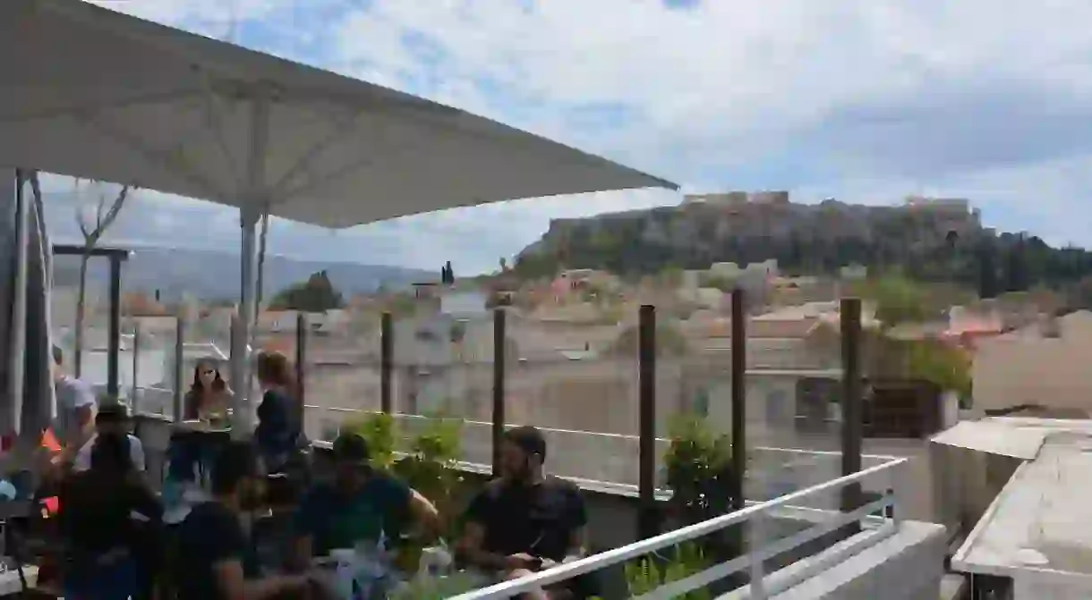 Enjoy your drink with a view of the Acropolis at Couleur ­Locale