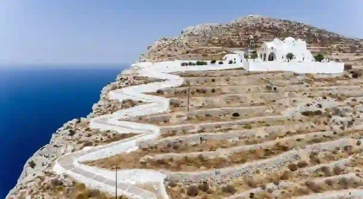 The Church of Panagia rises above the Aegean on the island of Folegandros, where the hotels are as charming as the island itself