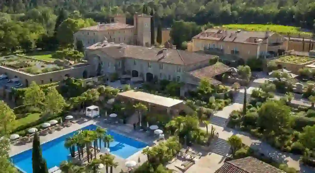 A view of the outdoor pool will quickly entice the kids outdoors at the Château de Berne