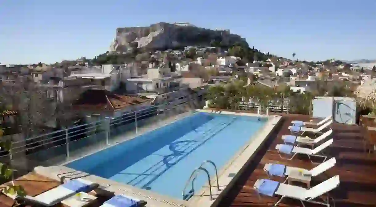 The pool at Electra Palace Athens comes with an Acropolis view