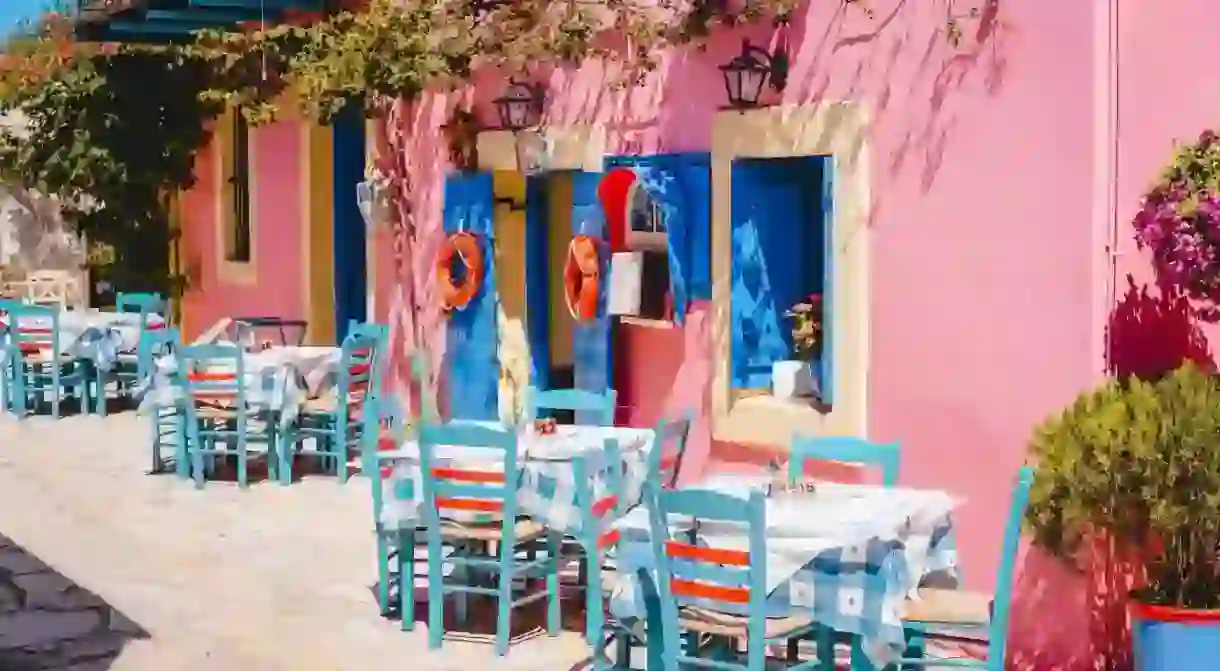 Traditional Greek taverns with vividly coloured façades await on Kefalonia