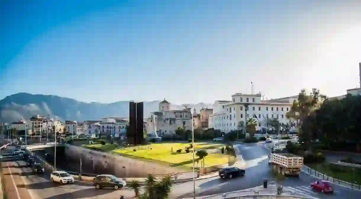 From the luxury rooms at the Porta Aragonese in Palermo, you can see mountains in the distance