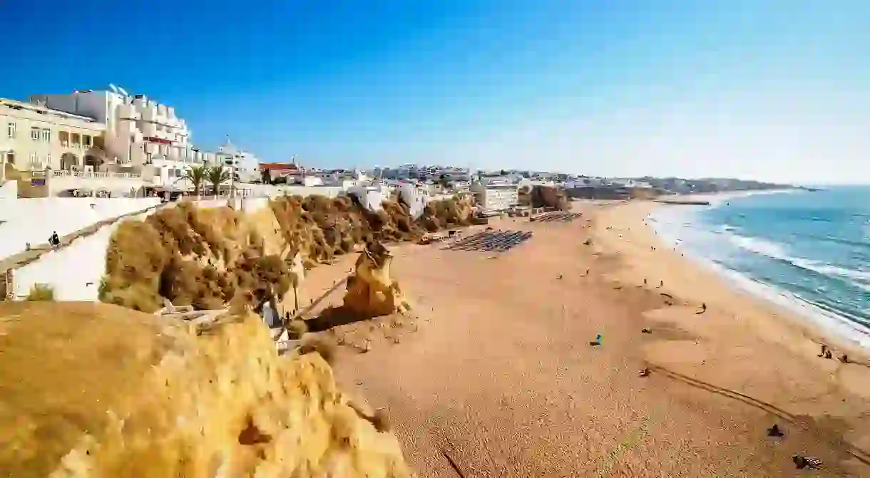 Peneco Beach in Albufeira, Portugal, beckons with golden sands