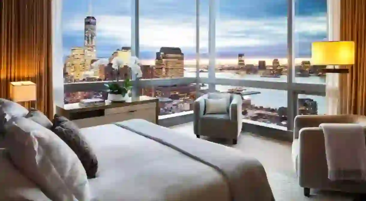 Enjoy sweeping views of Manhattan and the Hudson River from the luxurious rooms at the Dominick