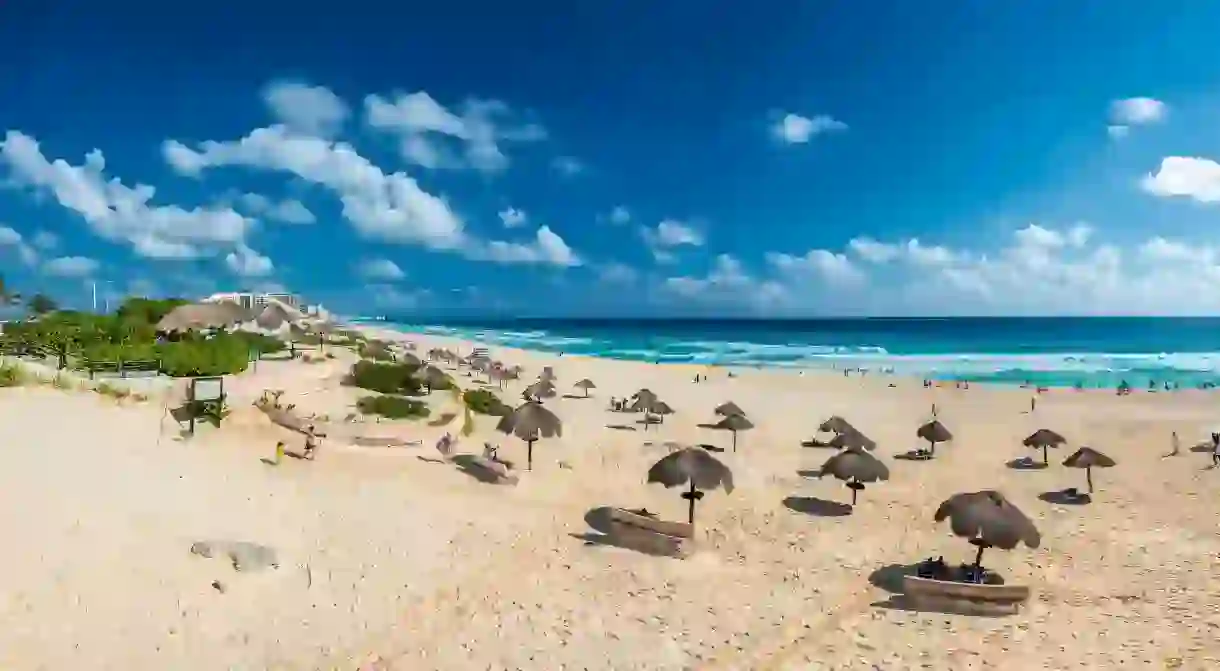 Cancúns spectacular stretch of fine-sand beach is easily accessible from the resorts more affordable hotels