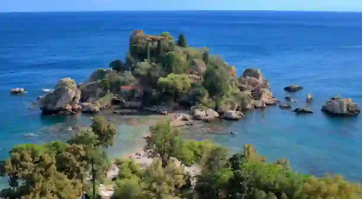 Enjoy a stroll around rocky, tree-clustered Isola Bella island