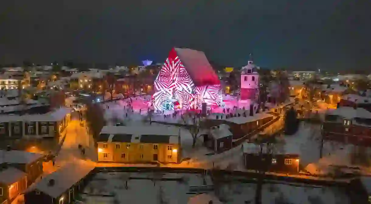 Porvoo Christmas Market is simply magical, with fairy lights strung above cobbled streets and a rainbow of colourful wooden houses