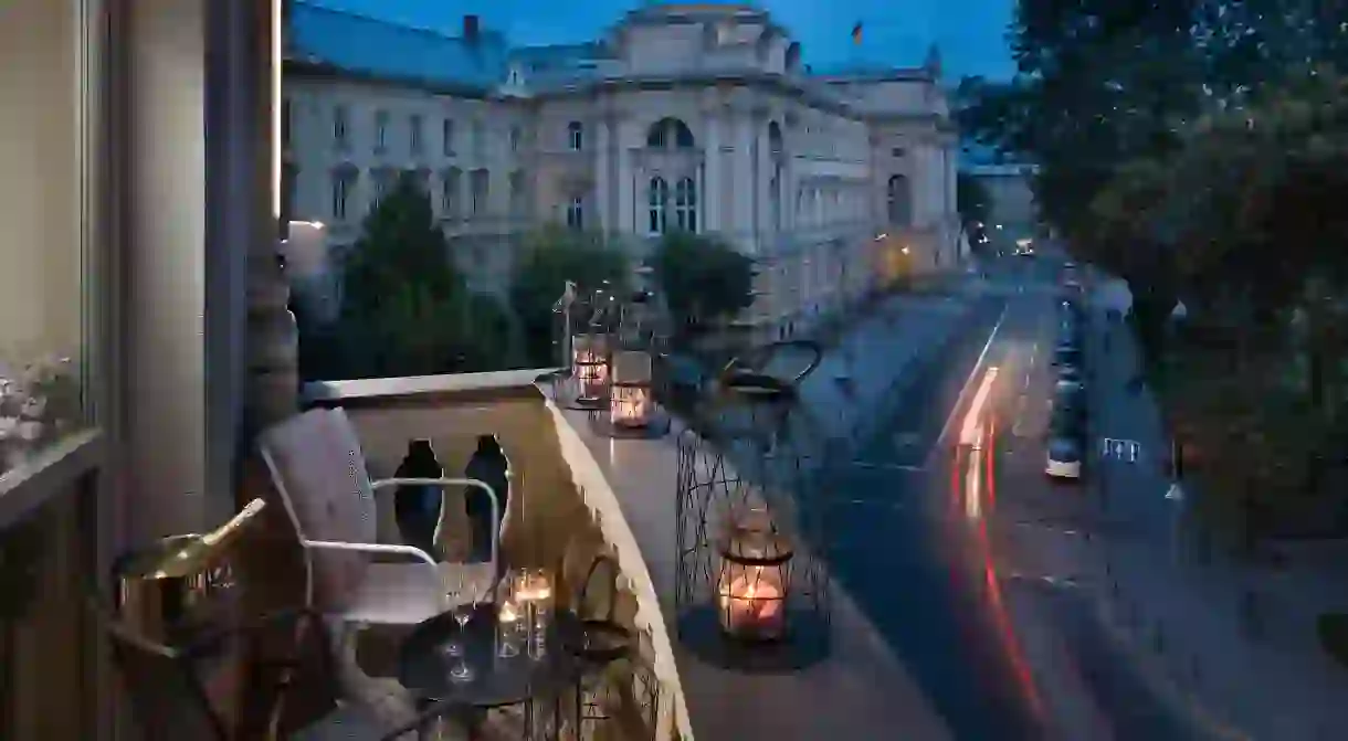 Take in the streets of Lviv from your balcony at the grand Bankhotel