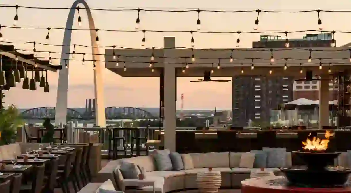 Soak up city views at sunset from the rooftop bar of the Four Seasons St Louis on your next trip to Missouri