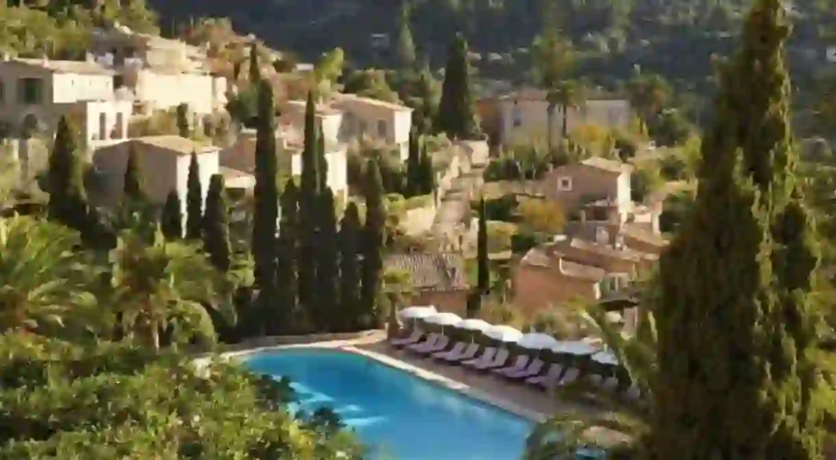 The terrace at Belmond La Residencia, set among olive and citrus trees, is one of the most romantic spots on Mallorca