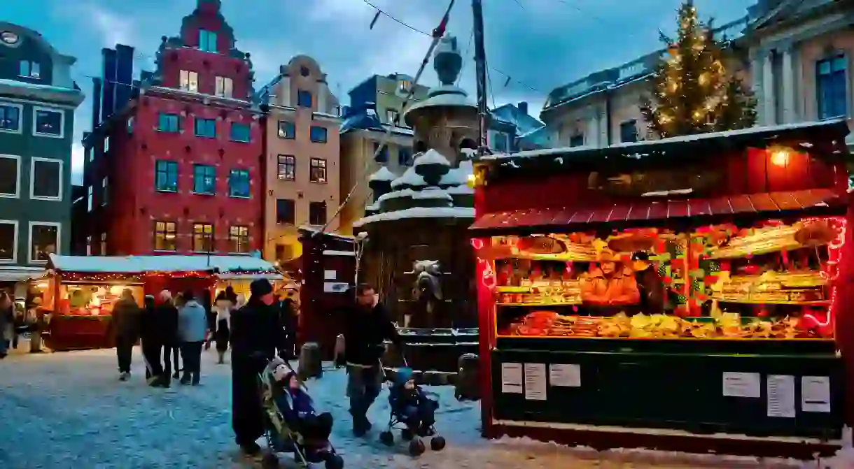 Get in the holiday spirit by visiting the Christmas market in Gamla Stan, Stockholm