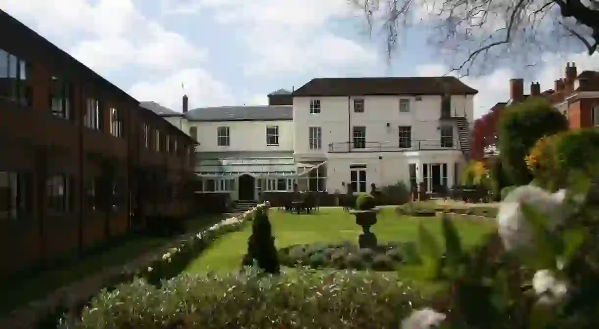 Rooms at the Winchester Royal Hotel face a calming garden