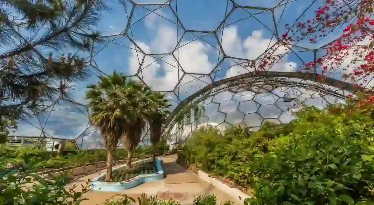 Explore the fascinating greenhouse domes at the Eden Project before a cosy stay nearby