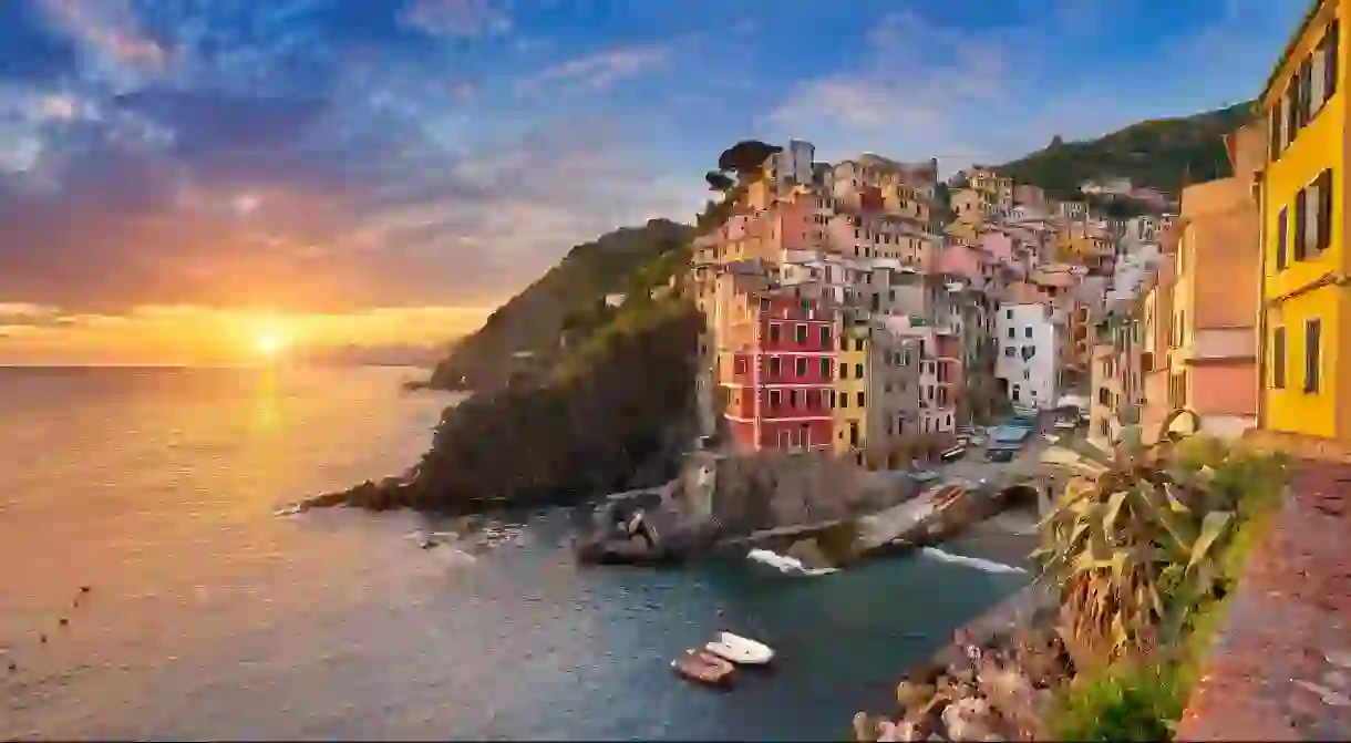 The coastal region of Liguria stretches from the towns of Cinque Terre, like colourful Riomaggiore, to the Italian Riviera