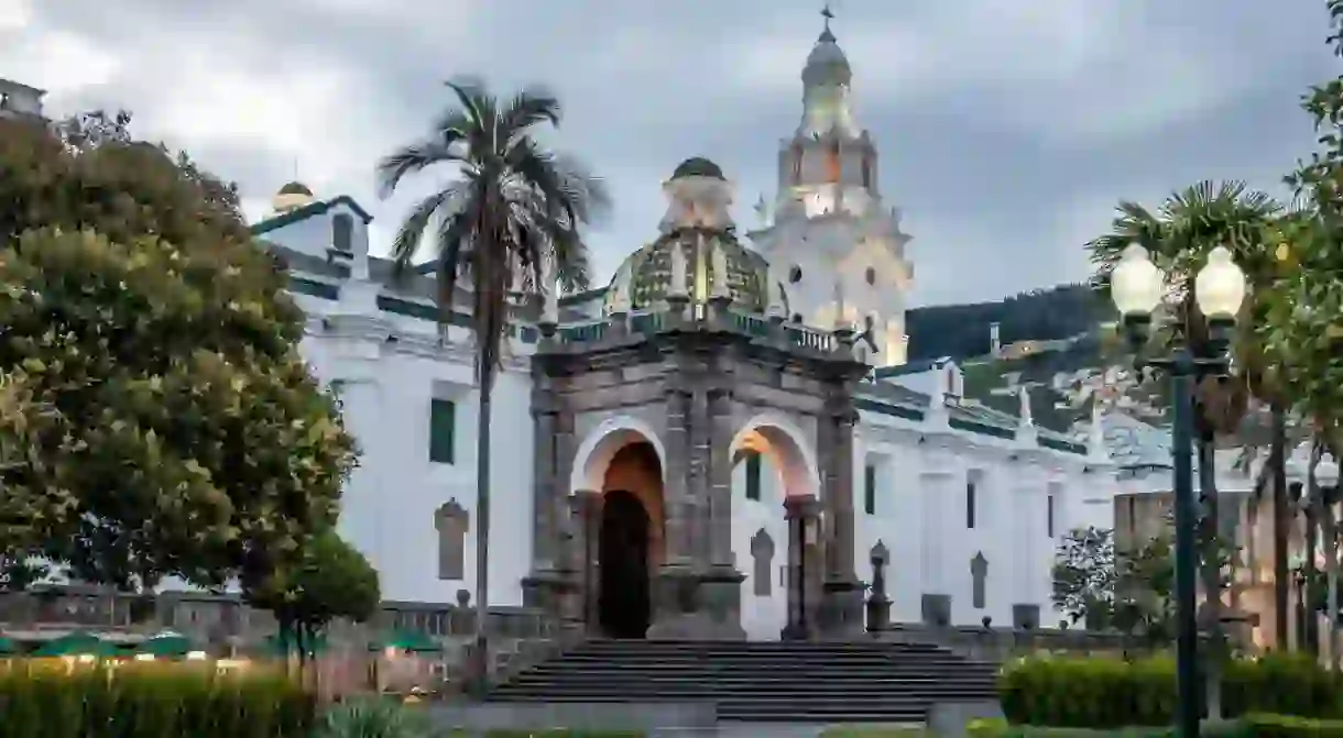 Plaza Grande and the adjacent Metropolitan Cathedral of Quito at dusk