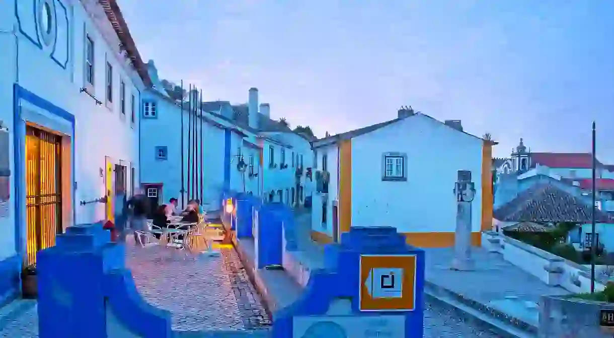 Drink the night away and watch the Portuguese cobbled streets come to life