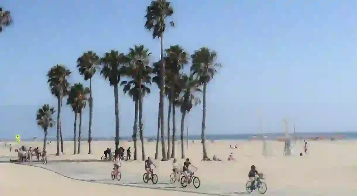 Riding a cruiser along the bike path at Santa Monica Beach is a quintessential activity in this coastal community