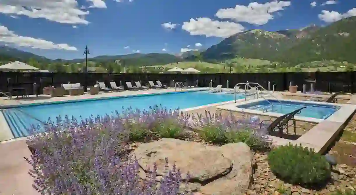 Relax by the pool after hitting the slopes or hiking trails around Big Sky, Montana