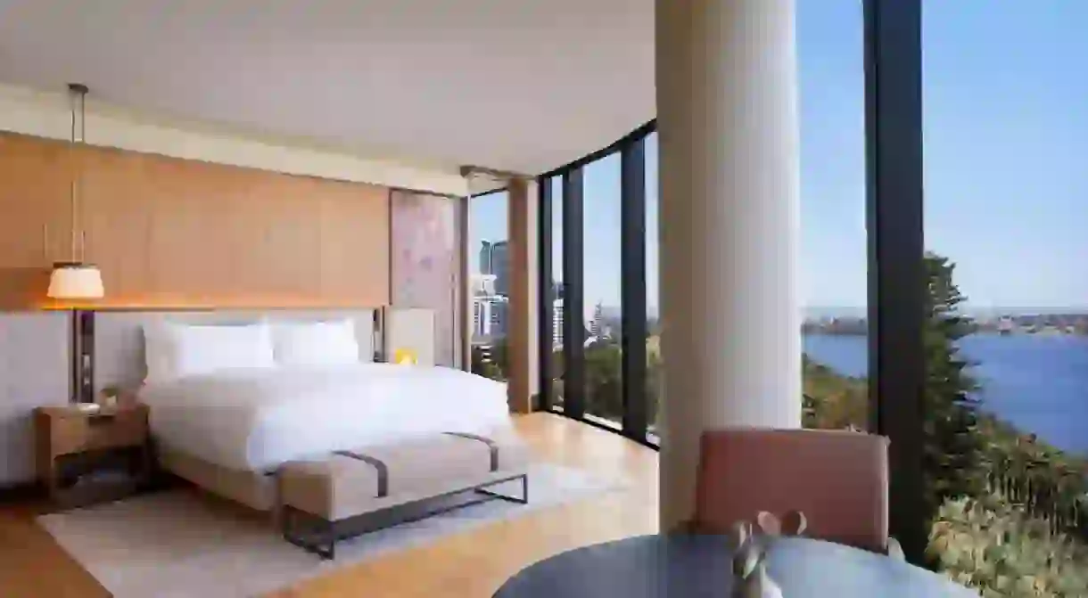 Gaze out over the Swan River through floor-to-ceiling windows at the Ritz-Carlton, Perth