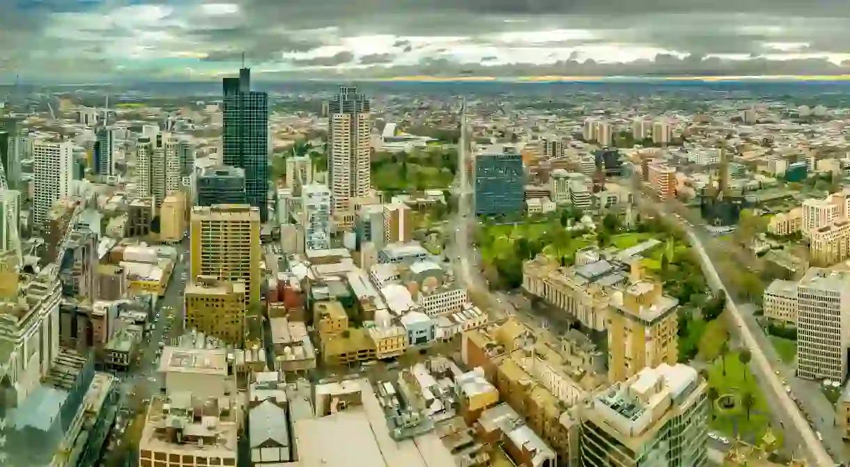 Melbourne is a sprawling city with many attractions, such as Parliament House, as seen on the right