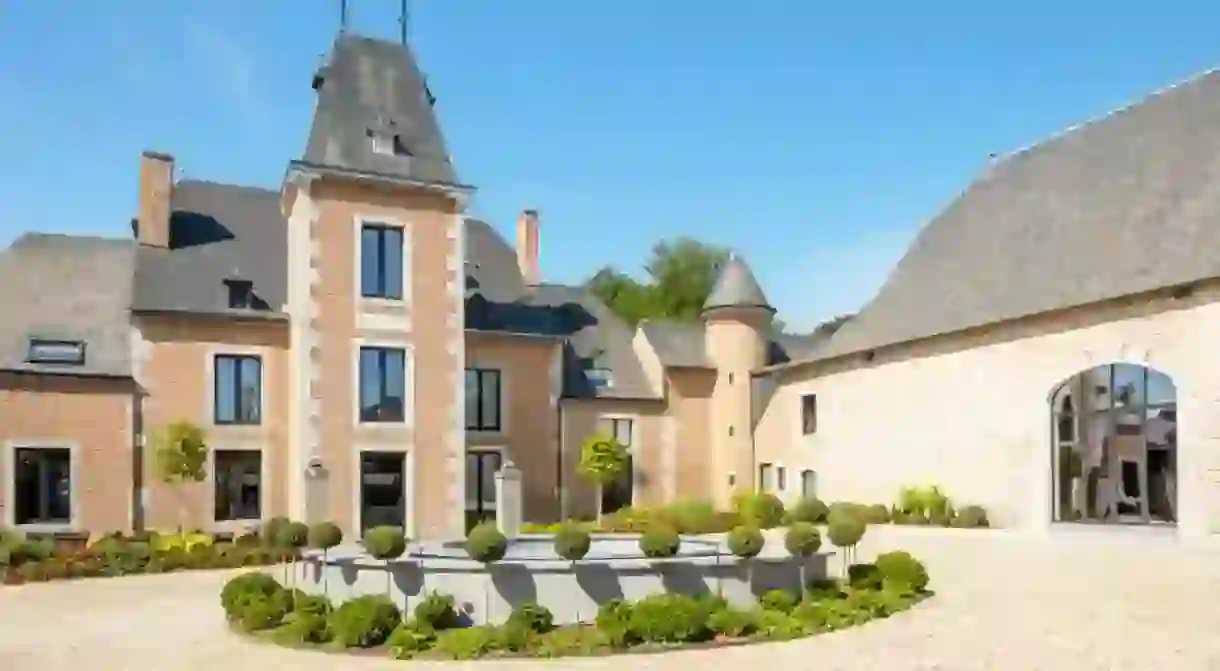 Château de Vignée is an immaculately restored manor house that reflects the lovely landscapes of the Ardennes around it