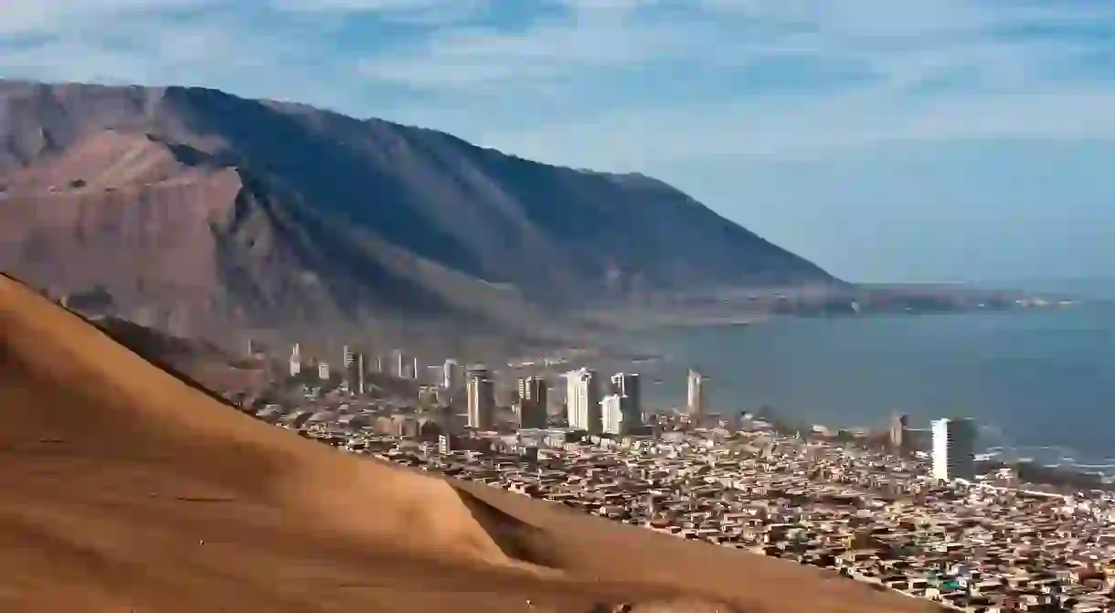 Iquique sits behind a huge dune in Northern Chile