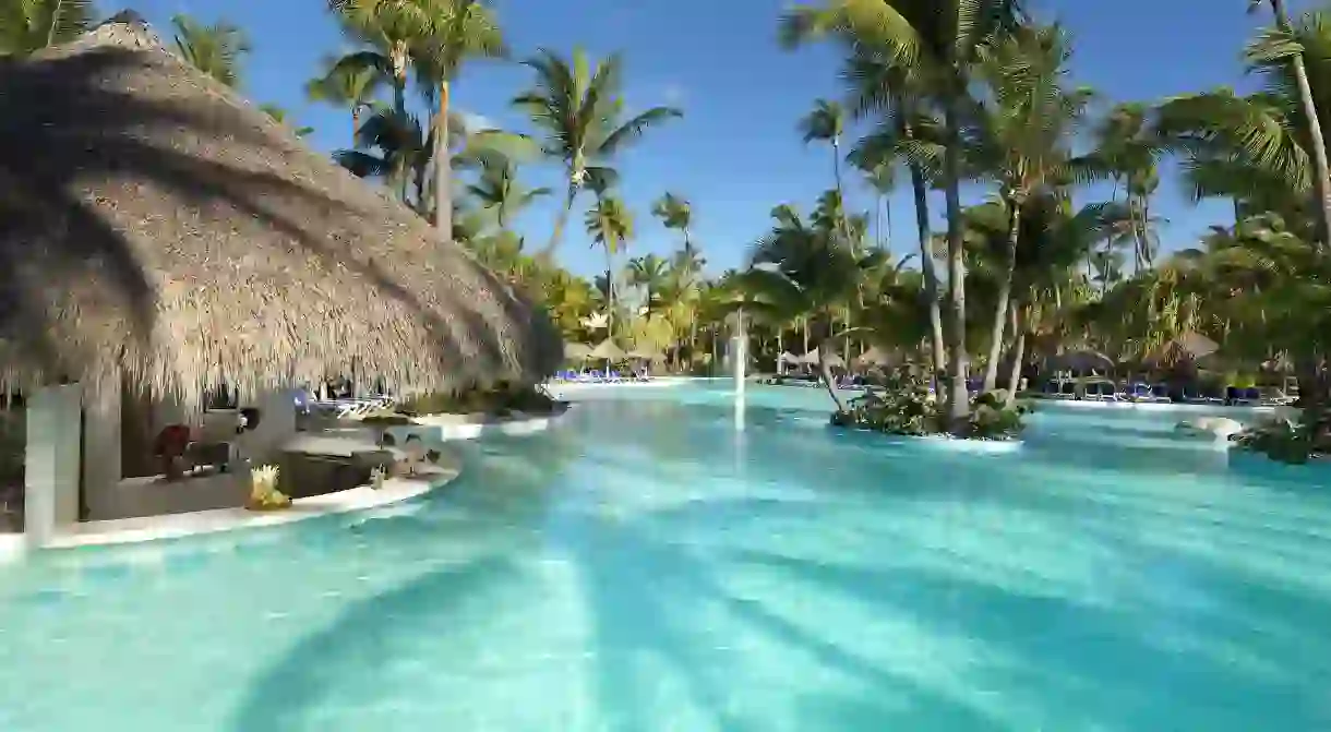 Even on a budget, you can enjoy a swim-up bar at the Meliá Caribe Beach Resort