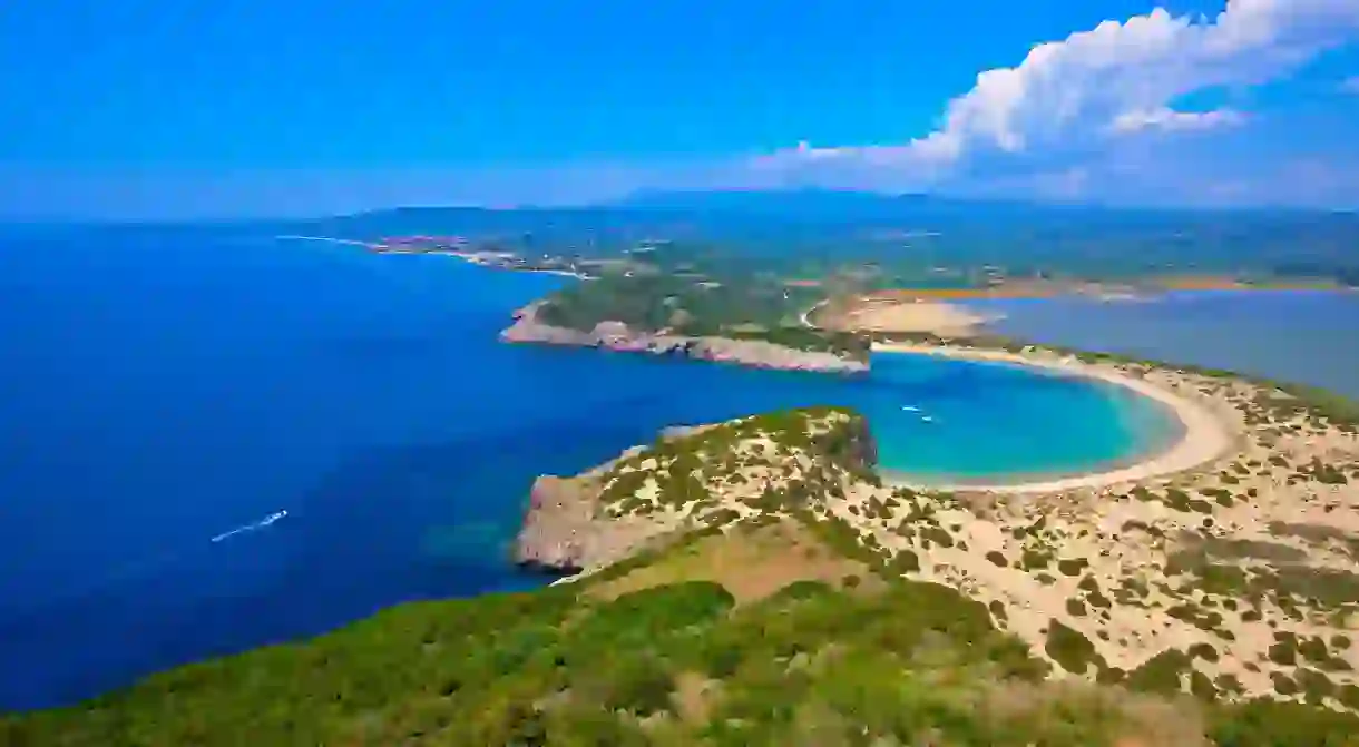 The omega-shaped Voidokilia Beach is one of the beautiful spots near Costa Navarino