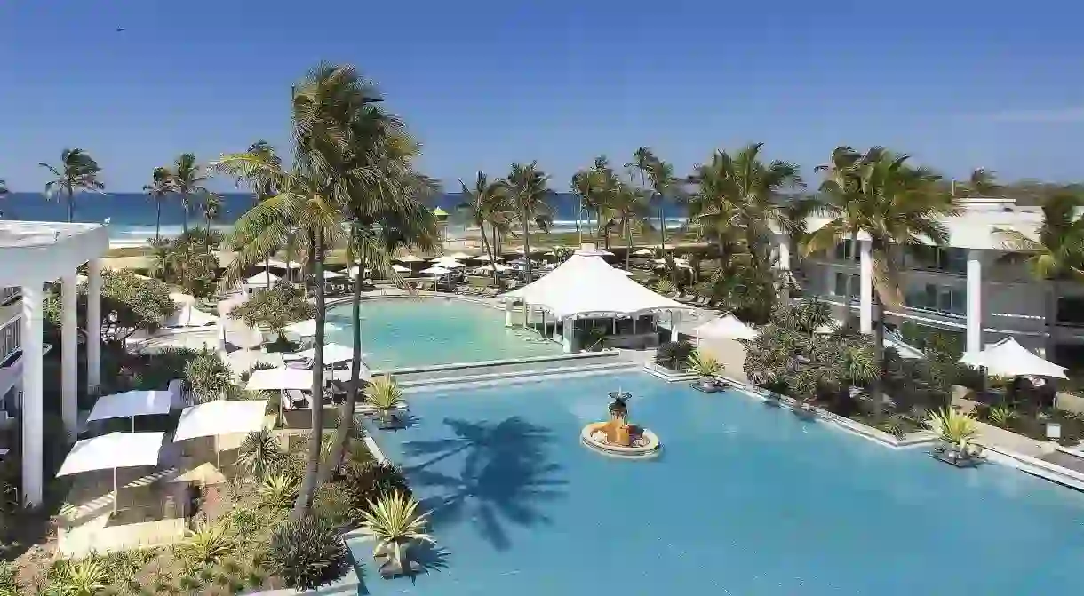 The Sheraton Grand Mirage Resort is steps from Mirage Beach and boasts a spectacular pool area with a swim-up bar