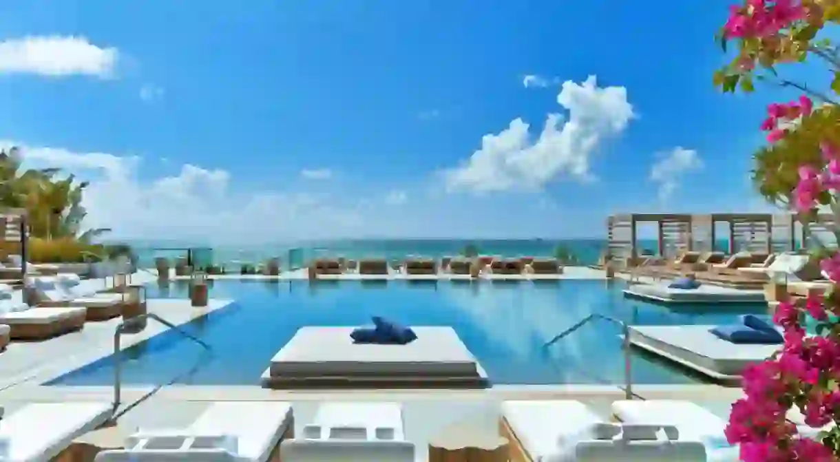 Its easy to relax when you can choose between taking a dip in the pool and lounging on a private beach at 1 Hotel