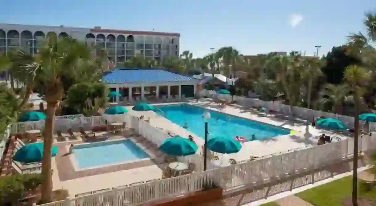 Splash around the large pool and hot tub at the Island by Hotel RL