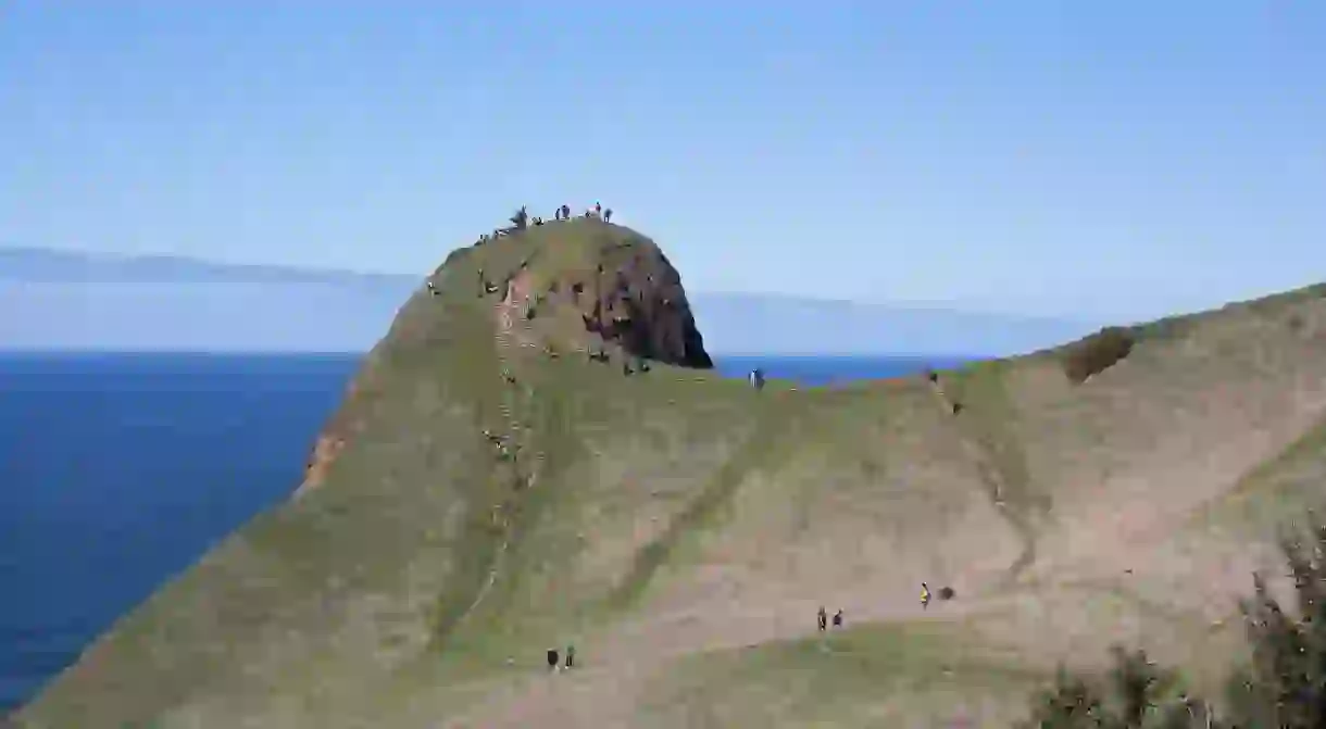 Hiking to Gods Thumb, a steep volcanic plug along the coast, is one of many outdoor activities in Lincoln City, Oregon