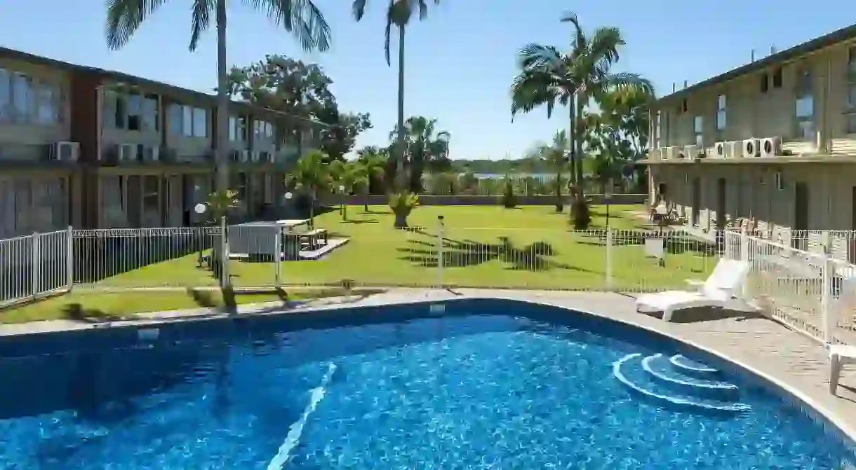 Enjoy a refreshing swimming pool and riverside views at the Mid-City Motor Inn in Mackay