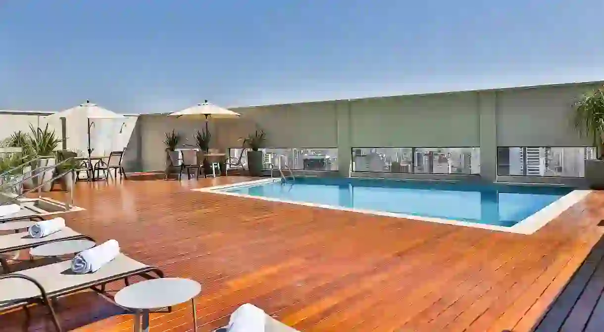 The rooftop pool at the San Marino Suite Hotel offers expansive city views