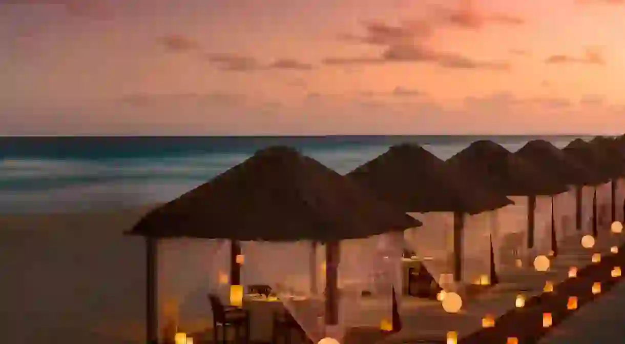 Enjoy a romantic dinner near the water at one of these top beachside restaurants in Cancun