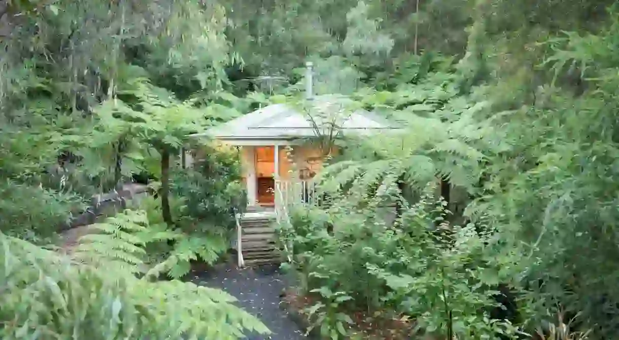 Enjoy a romantic getaway in a hidden cottage at Myers Creek Cascades in Healesville