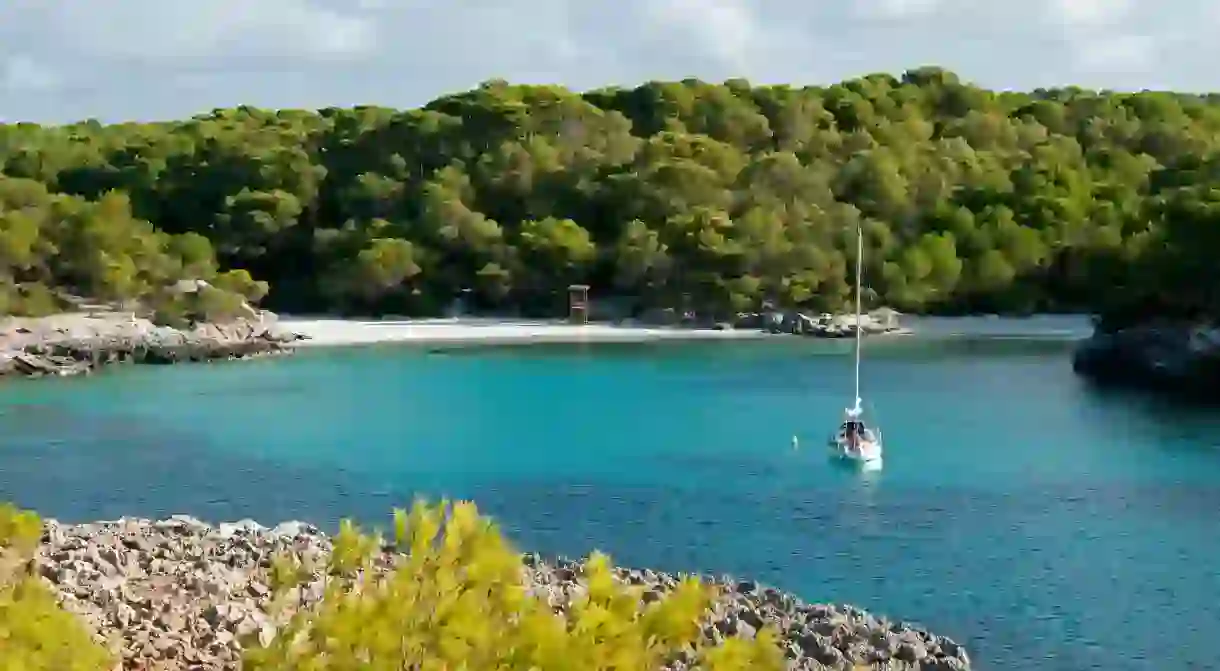 Discover the stunning coastline and natural beauty of Menorca as you sail around the island