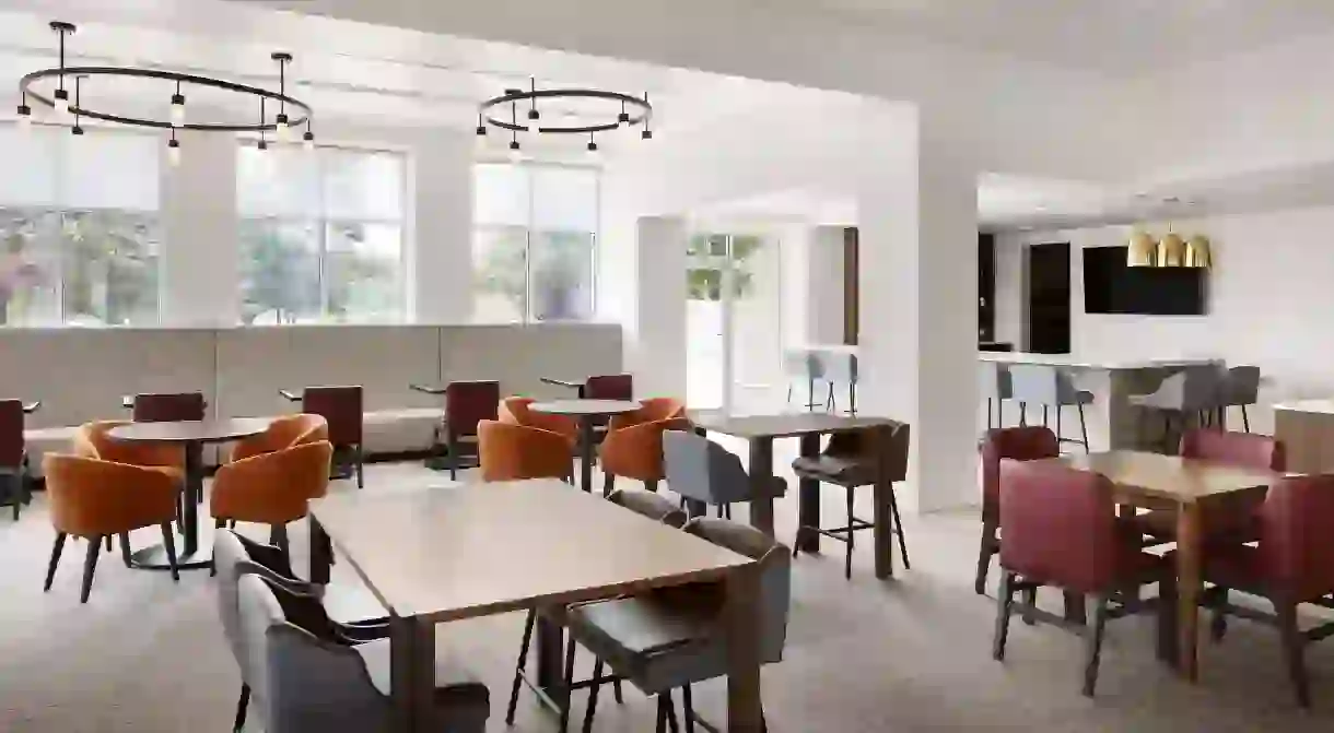 Enjoy a meal in the cozy dining area at the Hilton Garden Inn