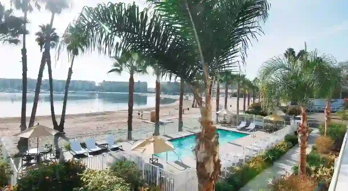 Enjoy pool time just steps from the marinas calm beach at Jamaica Bay Inn Marina Del Rey