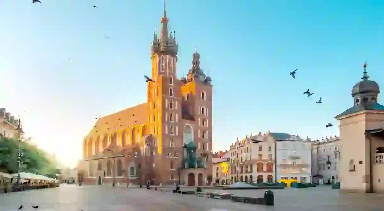 Mariacki Cathedral at Market square in Krakow at sunrise, Poland