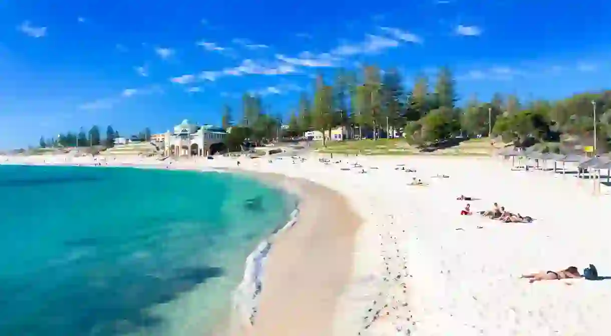 Relaxing at Cottesloe Beach on a beautiful summers day is part of a dream Perth holiday