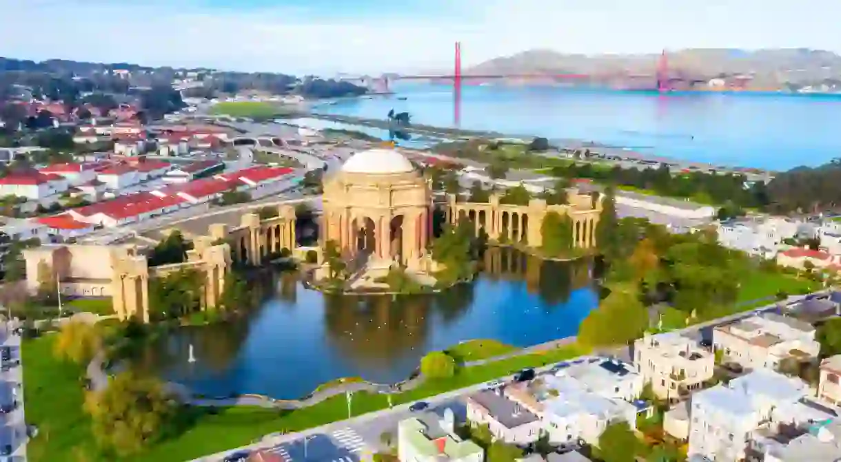 Palace of Fine Arts, in San Francisco with the Golden Gate Bridge in the background