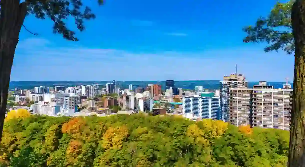 Hamilton skyline from Sam Lawrence park during the beginning of the fall, a beautiful scene with blue sky and few white clouds