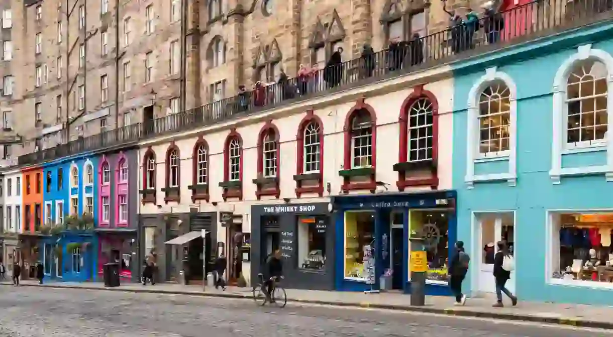 Edinburgh Old Town - colourful painted shops on Victoria Street and West Bow, pedestrianised during coronavirus pandemic, Edinburgh, Scotland, UK