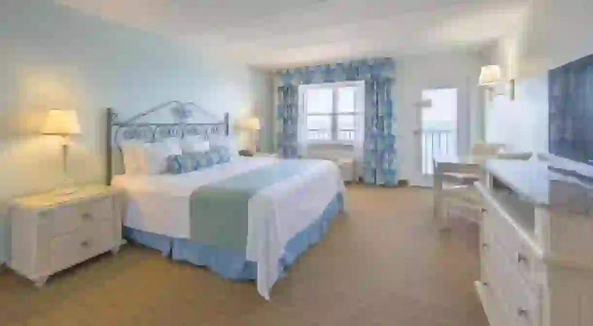 Rooms at Dunes Manor Hotel & Dunes Suites reflect the seaside location