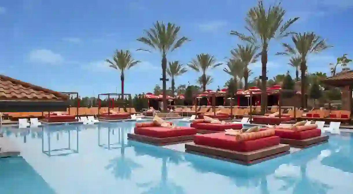 Enjoy ultimate pampering on the poolside daybeds at the Golden Nugget Lake Charles